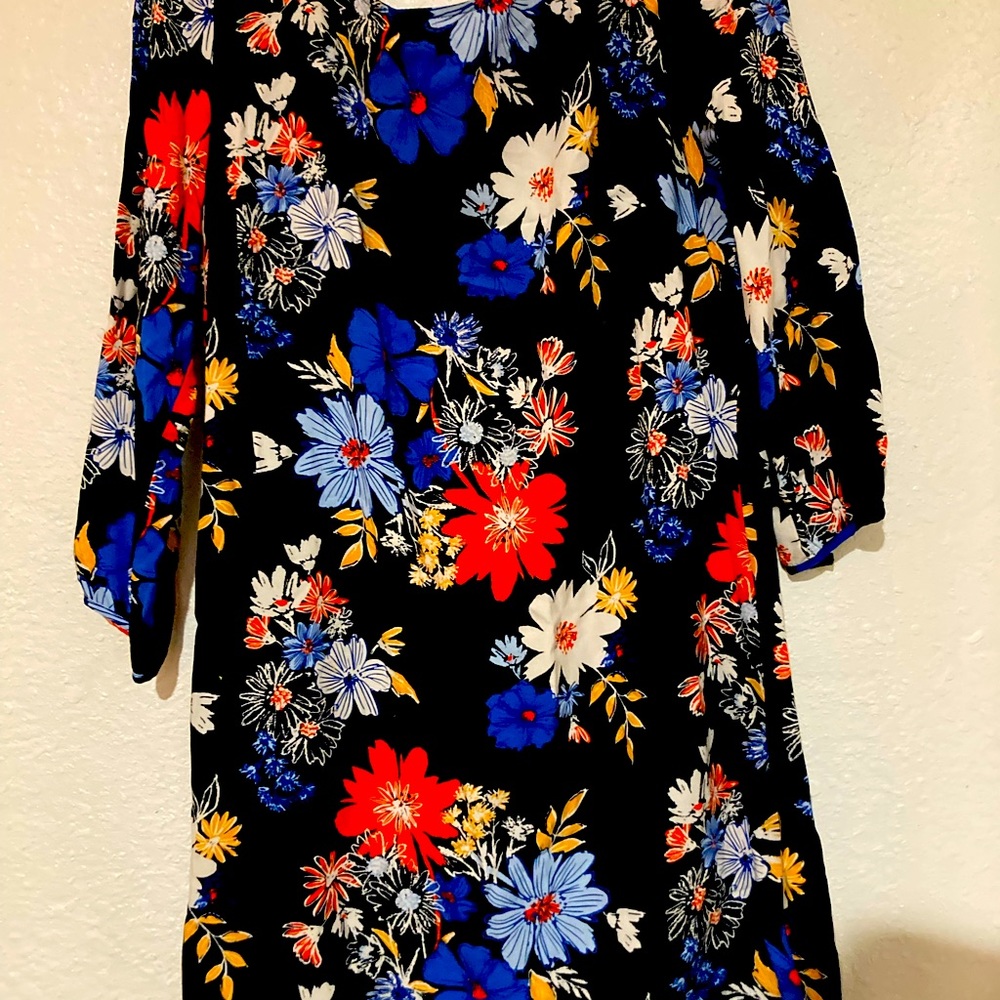 Heavy cotton dress slightly above the knee.